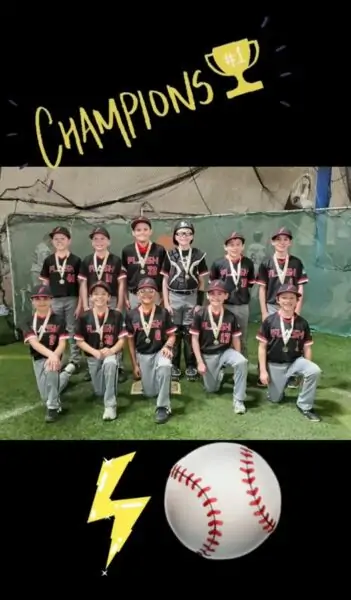 11U FLash boys baseball team kneeling with championship medallions