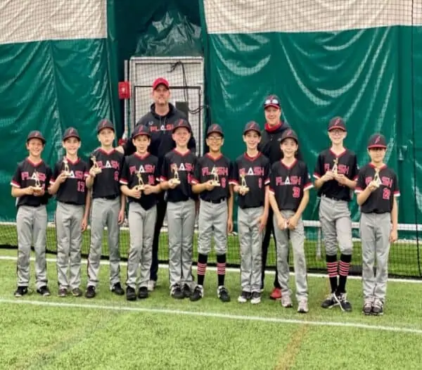 11U Flash baseball team with coaches holding small trophies for second place