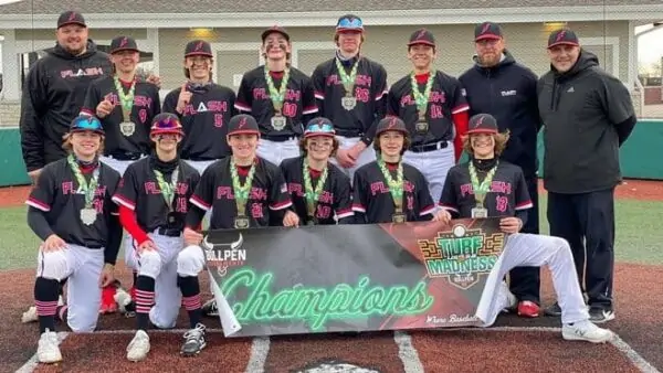 14U Flash boys baseball team with coaches holding up a Turf Madness USSSA championship banner