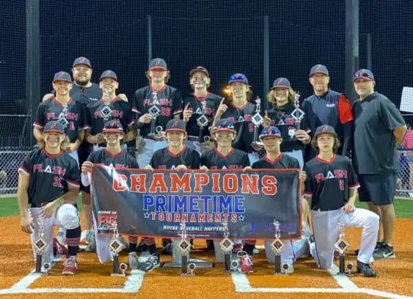14 U boys Flash baseball team and coaches holding trophies and a Primetime Tournaments Champions banner